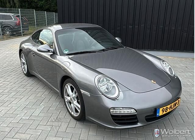 Grijs (metallic) Occasion 2009 Porsche 911 Carrera Coupé | € 54.600 (Eerlijke prijs) - Afbeelding 1/4