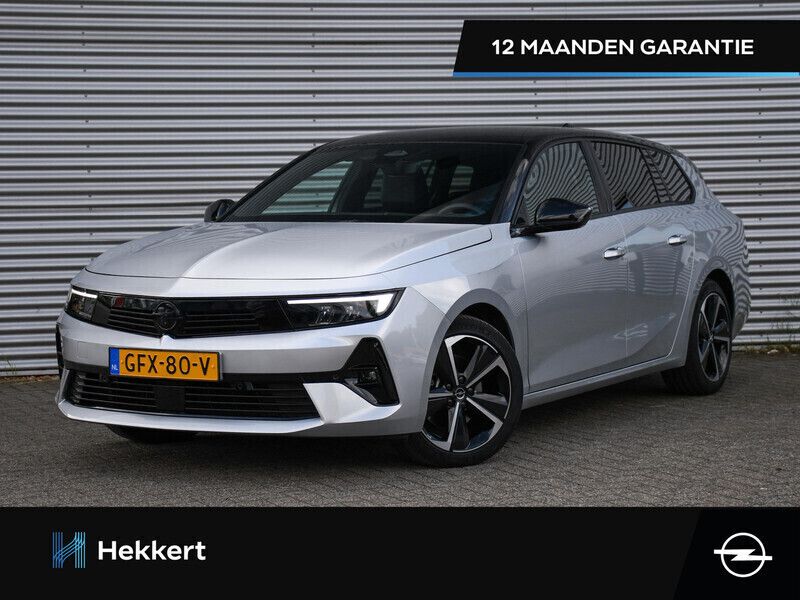 Grijs, metallic lak Gebruikt 2024 Opel Astra Stationwagen | € 31.995 (Eerlijke prijs) - Afbeelding 1/4
