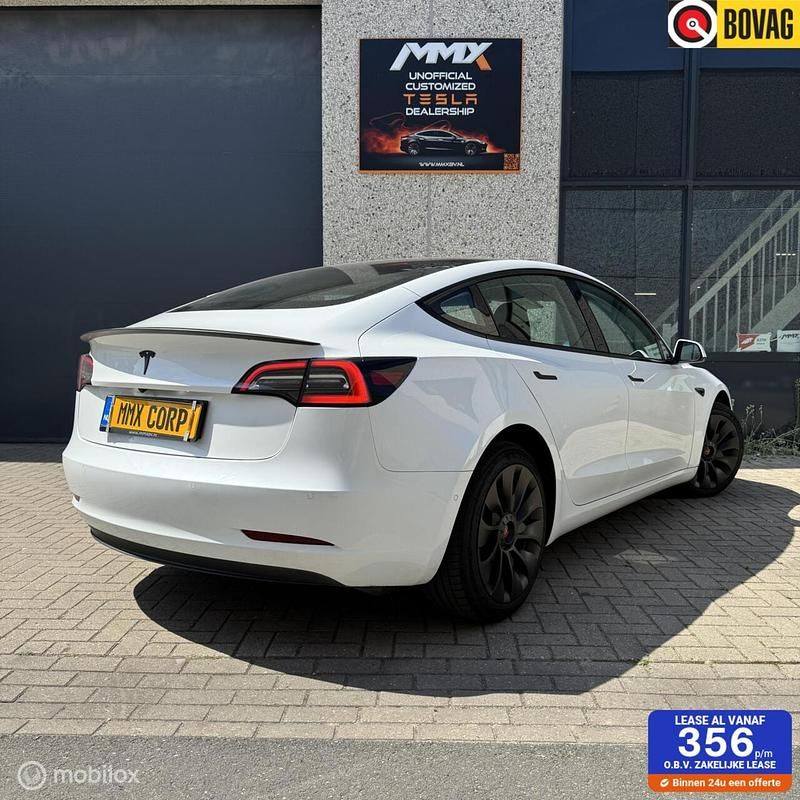 Wit Gebruikt 2021 Tesla Model 3 Standard Range Sedan | € 21.999 (Eerlijke prijs) - Afbeelding 1/4
