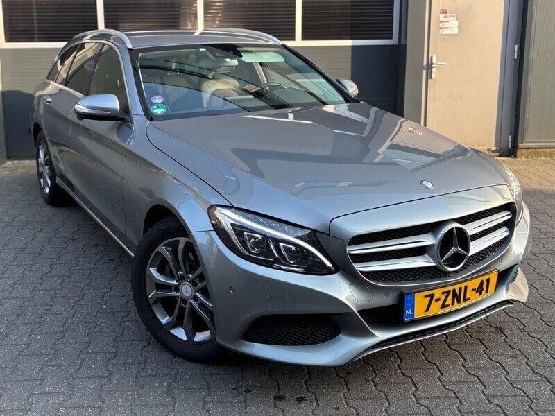 Grijs Gebruikt 2015 Mercedes C180 Ambition Stationwagen | € 16.950 (Eerlijke prijs) - Afbeelding 1/4