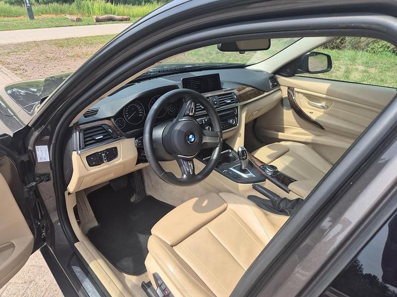 Bruin Gebruikt 2013 BMW 335 Executive Stationwagen | € 18.900 (Super prijs) - Afbeelding 1/4