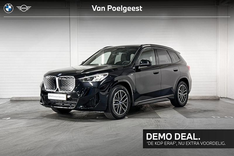 Zwart Gebruikt 2025 BMW iX1 Comfort Edition SUV | € 42.900 - Afbeelding 1/4