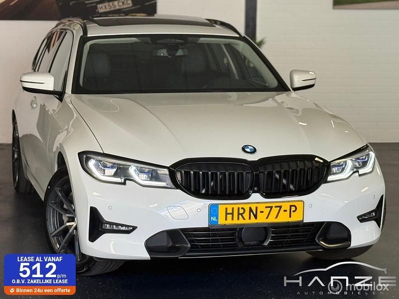 Wit Gebruikt 2021 BMW 330 Executive Stationwagen | € 31.950 (Iets duurder) - Afbeelding 1/4