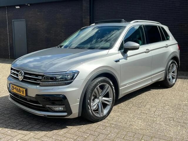 Grijs Gebruikt 2018 VW Tiguan Highline SUV | € 28.999 (Iets duurder) - Afbeelding 1/4