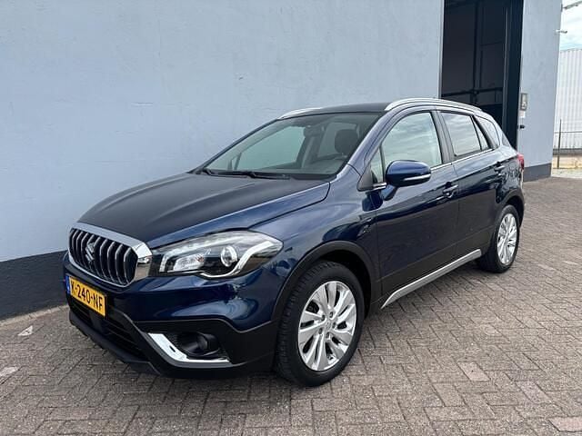 Blauw, metallic lak Gebruikt 2016 Suzuki SX4 S-Cross Exclusive SUV | € 13.750 (Eerlijke prijs) - Afbeelding 1/4