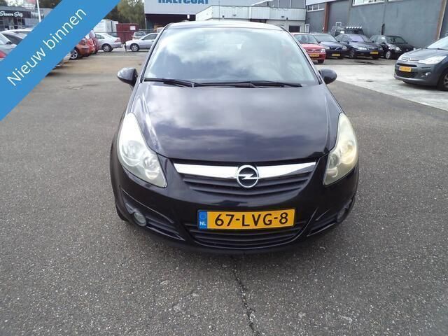 Zwart Gebruikt 2010 Opel Corsa Edition Hatchback | € 2.699 (Eerlijke prijs) - Afbeelding 1/4