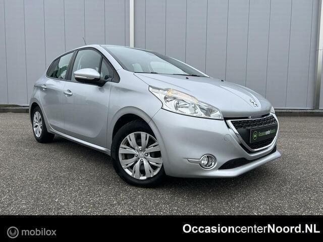 Grijs Gebruikt 2013 Peugeot 208 Envy Hatchback | € 4.499 (Eerlijke prijs) - Afbeelding 1/4