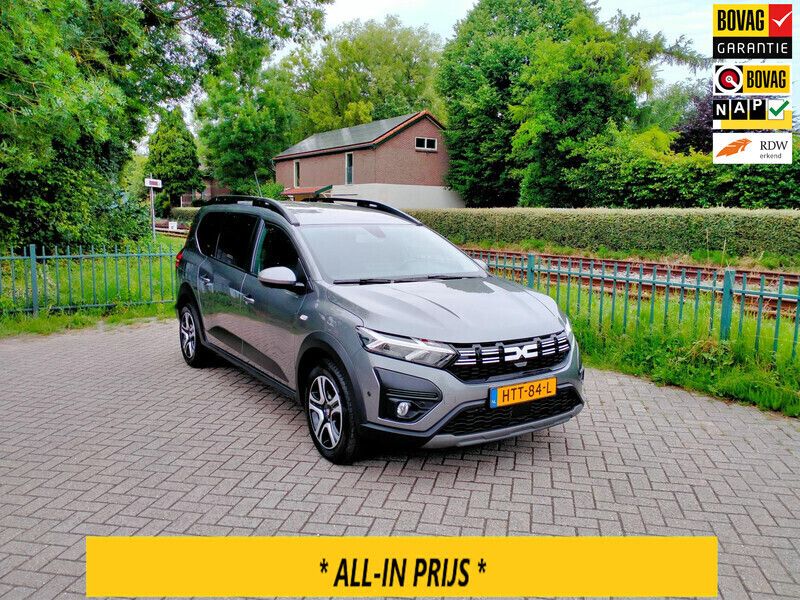 Grijs, metallic lak Gebruikt 2023 Dacia Jogger Expression MPV | € 26.250 (Eerlijke prijs) - Afbeelding 1/4