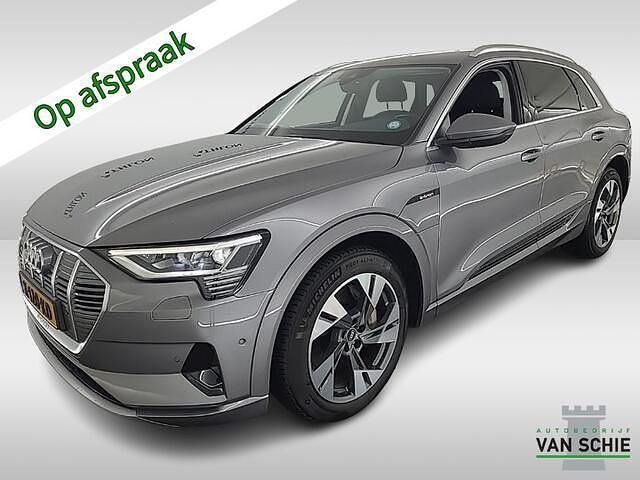 Grijs (metallic) Occasion 2020 Audi e-tron Business SUV | € 28.900 (Iets duurder) - Afbeelding 1/4