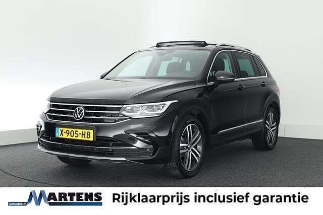 Zwart Gebruikt 2021 VW Tiguan Elegance SUV | € 30.949 (Goede deal) - Afbeelding 1/4