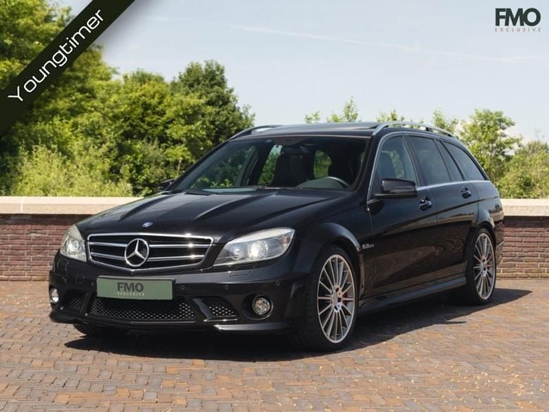Zwart, metallic lak Gebruikt 2010 Mercedes C63 AMG AMG Stationwagen | € 53.995 (Duur) - Afbeelding 1/4