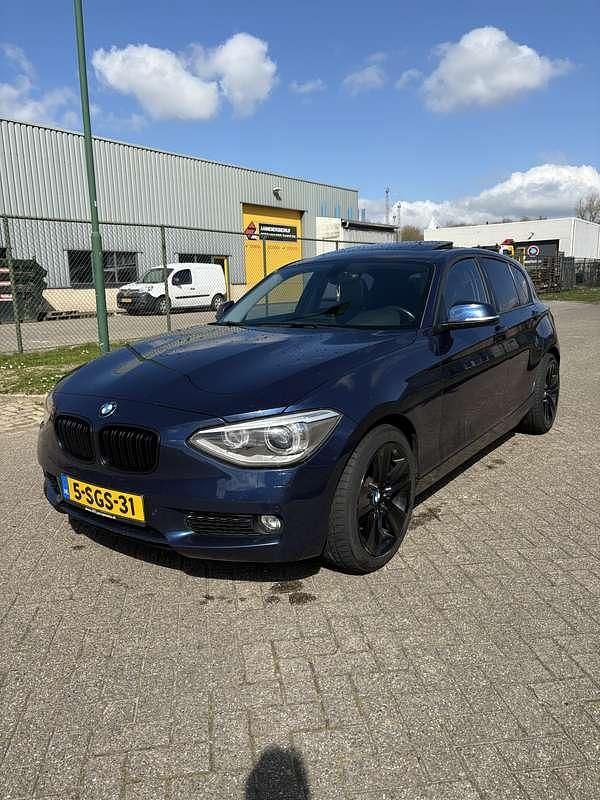 Blauw Gebruikt 2013 BMW 118 Executive Hatchback | € 7.500 (Eerlijke prijs) - Afbeelding 1/4