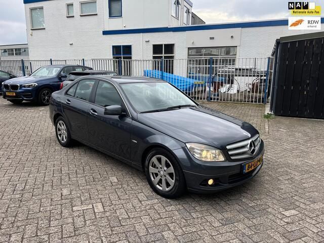 Grijs Gebruikt 2010 Mercedes C180 Business Sedan | € 3.950 (Eerlijke prijs) - Afbeelding 1/4