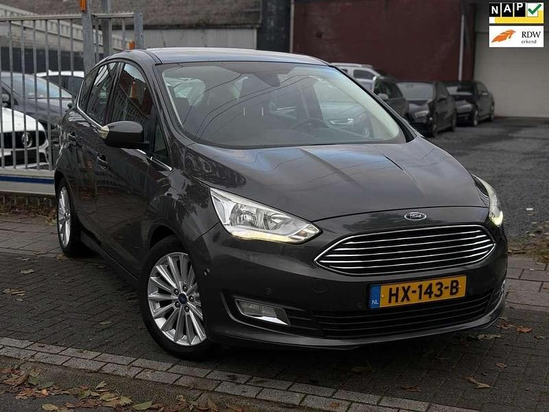 Grijs (metallic) Gebruikt 2016 Ford C-MAX Titanium MPV | € 8.495 (Eerlijke prijs) - Afbeelding 1/4