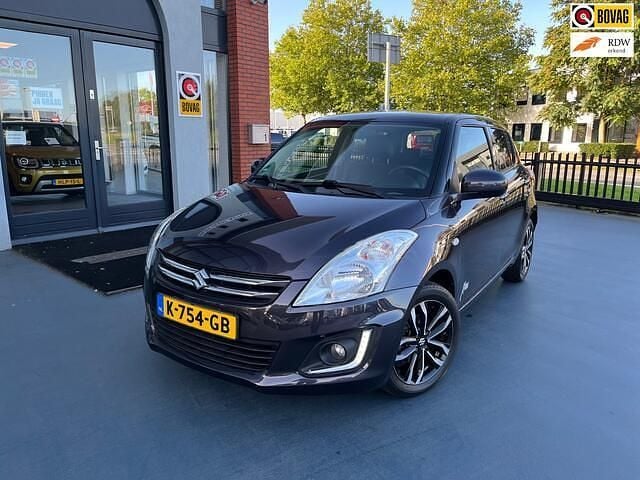 Paars Occasion 2015 Suzuki Swift Comfort Hatchback | € 8.950 (Eerlijke prijs) - Afbeelding 1/4