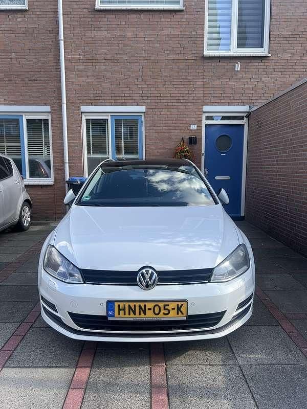 Wit Gebruikt 2014 VW Golf VII Highline Hatchback | € 11.800 (Eerlijke prijs) - Afbeelding 1/4