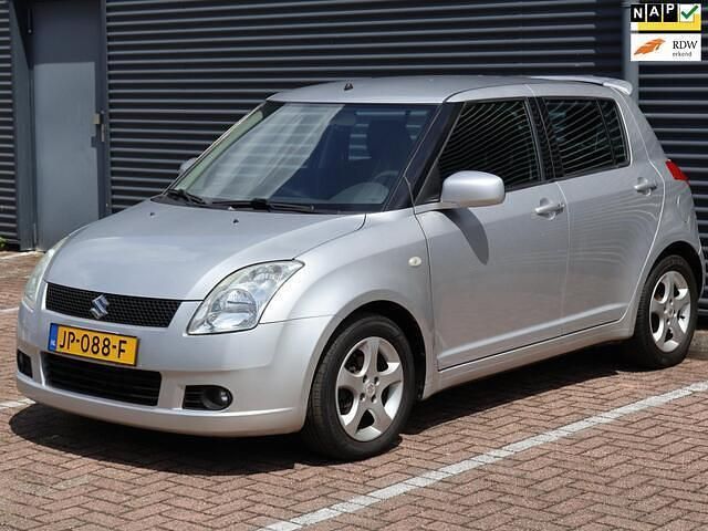 Grijs Gebruikt 2006 Suzuki Swift GLS Hatchback | € 5.299 (Eerlijke prijs) - Afbeelding 1/4