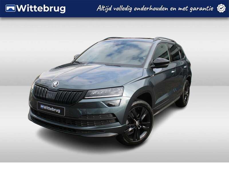 Grijs Gebruikt 2020 Skoda Karoq SportLine SUV | € 28.450 (Eerlijke prijs) - Afbeelding 1/2