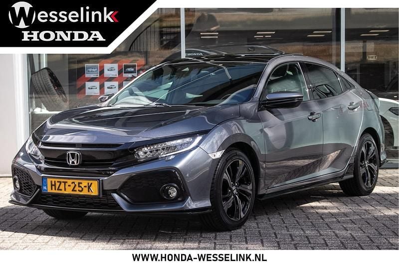 Grijs Gebruikt 2017 Honda Civic Sport Plus Hatchback | € 23.950 (Eerlijke prijs) - Afbeelding 1/4