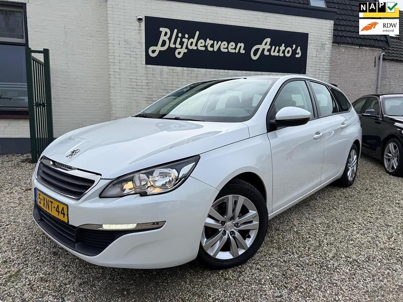 Wit Occasion 2014 Peugeot 308 Stationwagen | € 5.450 (Iets duurder) - Afbeelding 1/4