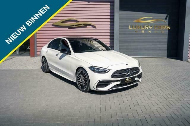 Wit Occasion 2021 Mercedes C200 AMG line Sedan | € 55.750 - Afbeelding 1/4