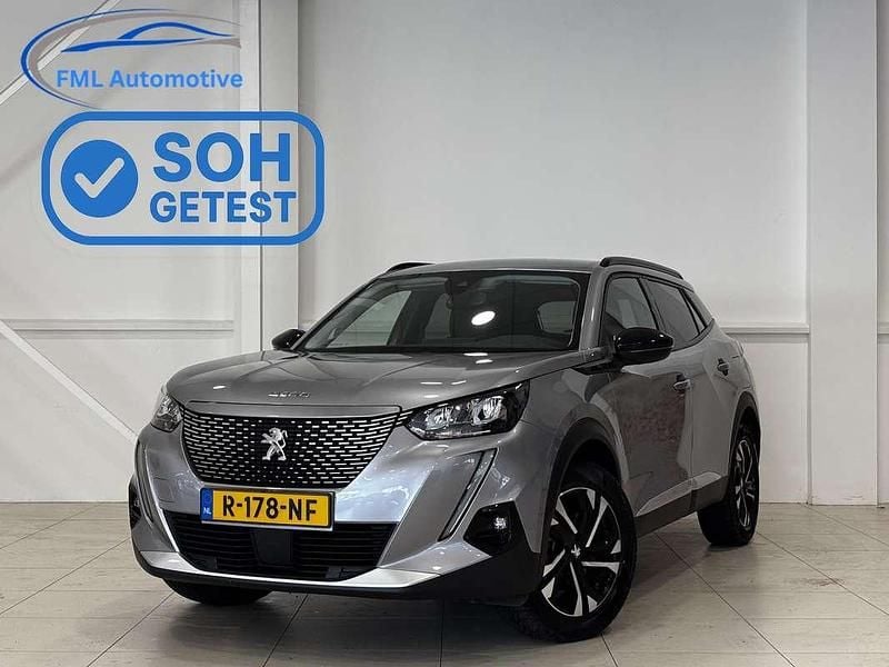 Grijs, metallic lak Gebruikt 2022 Peugeot e-2008 GTi SUV | € 17.820 (Goede deal) - Afbeelding 1/4
