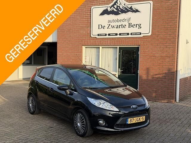 Zwart Occasion 2009 Ford Fiesta Titanium Hatchback | € 3.499 (Goede deal) - Afbeelding 1/4