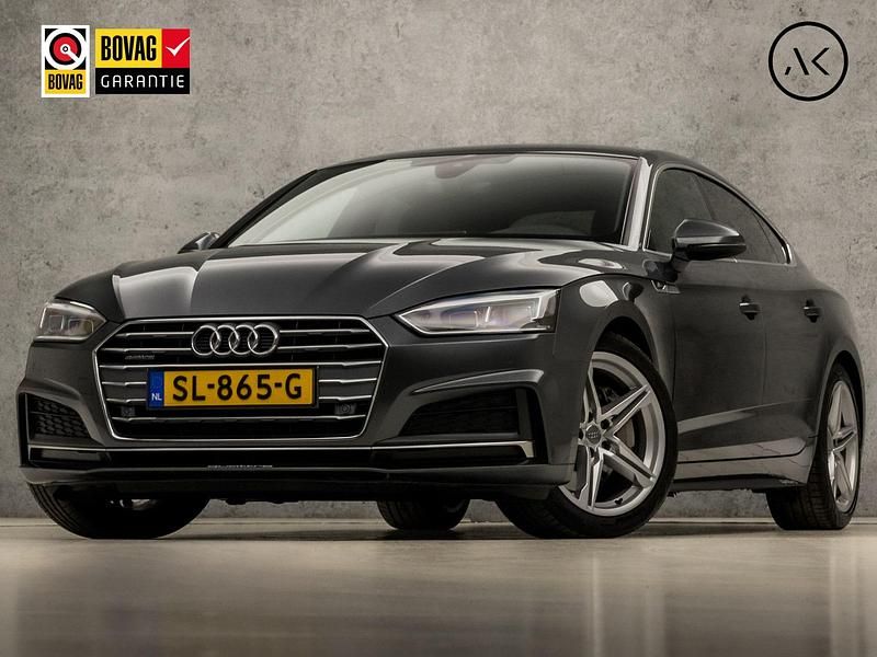 Grijs Gebruikt 2018 Audi A5 S-Line Hatchback | € 27.945 (Goede deal) - Afbeelding 1/4