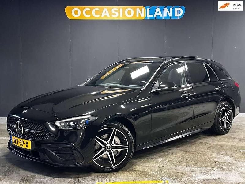 Occasion Mercedes C300e AMG line 204 PK (150 kW) 2022 Zwart Stationwagen