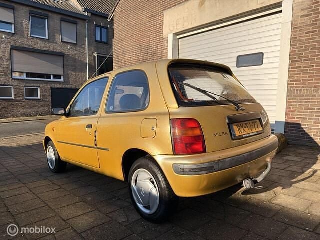 Occasion Nissan Micra 55 PK (40 kW) 1997 Geel Hatchback