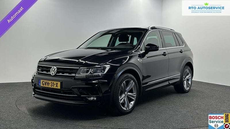 Zwart Gebruikt 2018 VW Tiguan Highline SUV | € 27.500 (Eerlijke prijs) - Afbeelding 1/4
