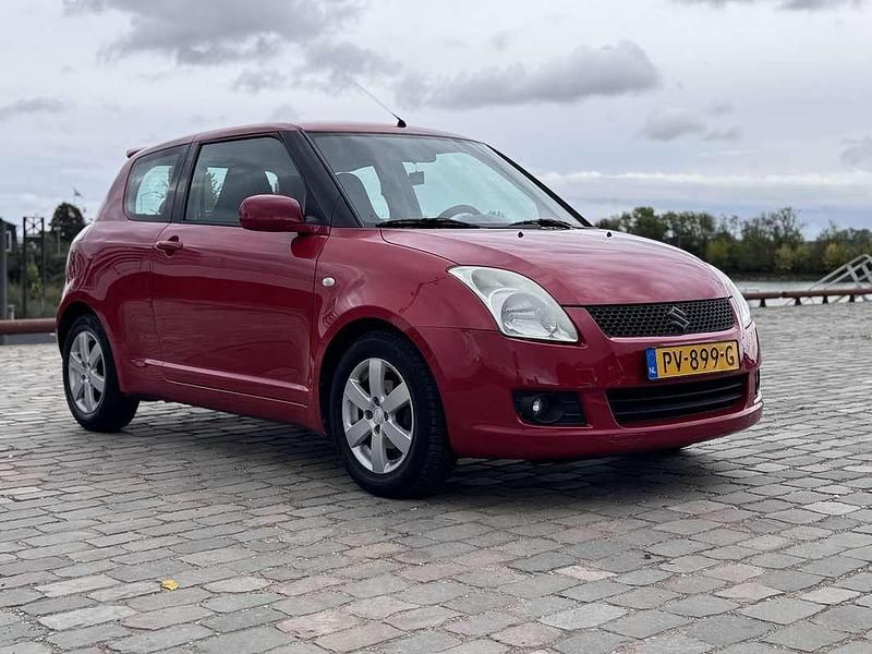 Rood Gebruikt 2009 Suzuki Swift Comfort Hatchback | € 2.895 (Goede deal) - Afbeelding 1/4