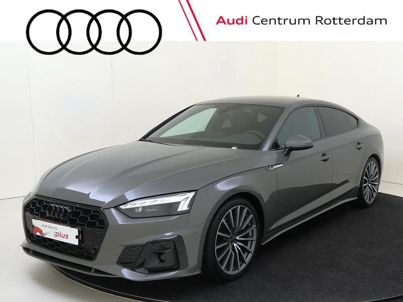 Grijs (metallic) Gebruikt 2024 Audi A5 Sportback Competition Hatchback | € 41.750 (Eerlijke prijs) - Afbeelding 1/4
