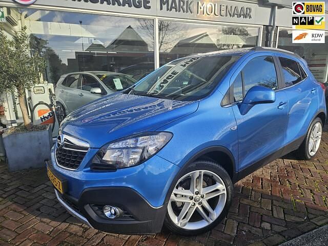 Blauw (metallic) Gebruikt 2015 Opel Mokka Cosmo SUV | € 12.950 (Eerlijke prijs) - Afbeelding 1/4