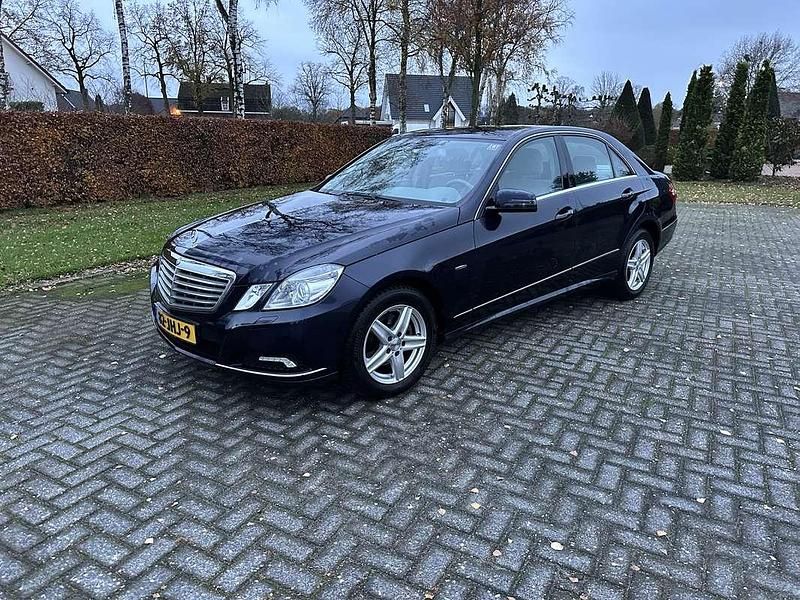 Blauw Occasion 2009 Mercedes E220 Elegance Sedan | € 6.250 (Eerlijke prijs) - Afbeelding 1/4