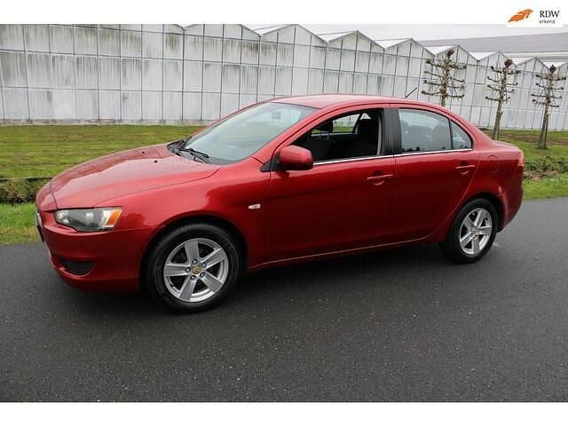 Rood (metallic) Gebruikt 2008 Mitsubishi Lancer Invite Sedan | € 6.450 (Eerlijke prijs) - Afbeelding 1/4