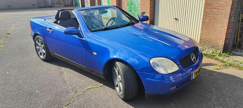 Blauw Gebruikt 1998 Mercedes SLK230 Cabriolet | € 3.250 (Eerlijke prijs) - Afbeelding 1/4