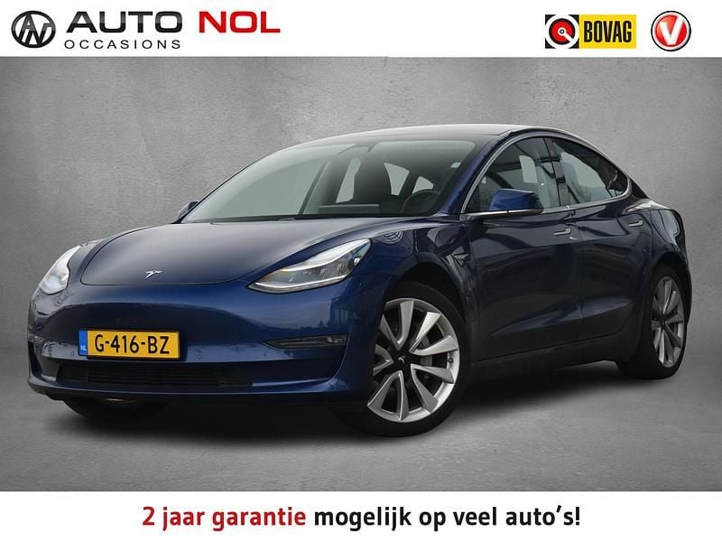 Blauw (metallic) Gebruikt 2019 Tesla Model 3 Standard Range Sedan | € 19.950 (Goede deal) - Afbeelding 1/4