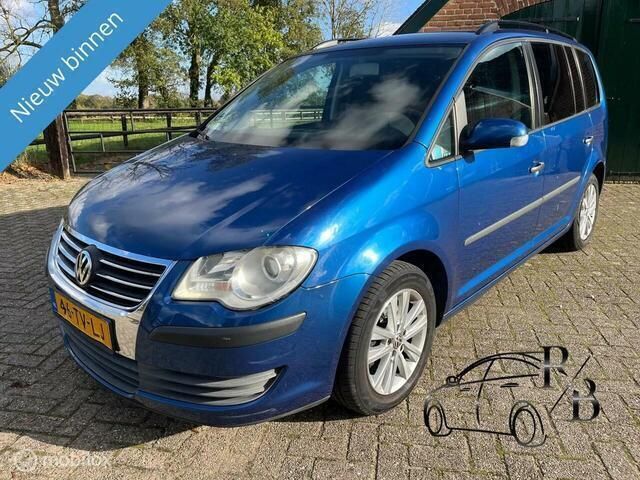 Blauw, metallic lak Gebruikt 2007 VW Touran MPV | € 2.799 (Iets duurder) - Afbeelding 1/4
