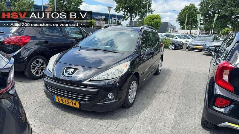 Zwart Gebruikt 2012 Peugeot 207 Active Stationwagen | € 2.450 (Goede deal) - Afbeelding 1/3