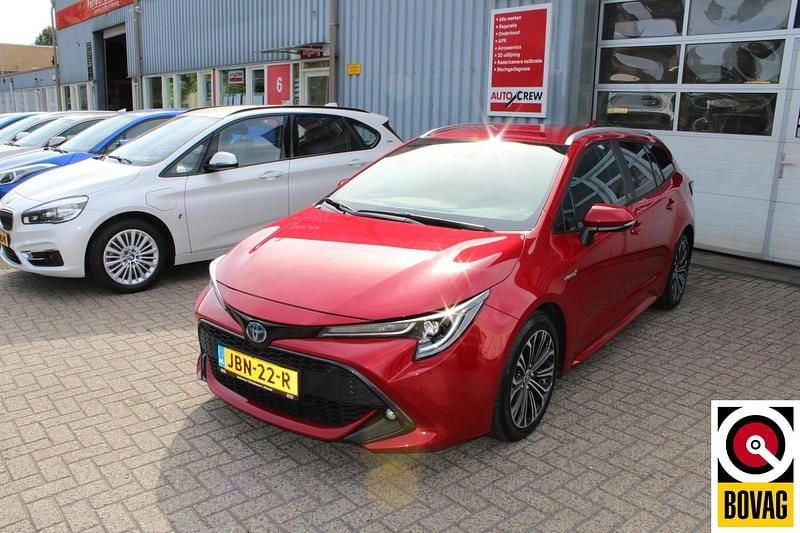 Rood Gebruikt 2020 Toyota Corolla Executive Stationwagen | € 21.900 (Goede deal) - Afbeelding 1/4