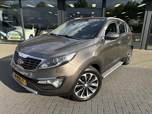 Bruin Gebruikt 2011 Kia Sportage Comfort SUV | € 6.999 (Eerlijke prijs) - Afbeelding 1/4