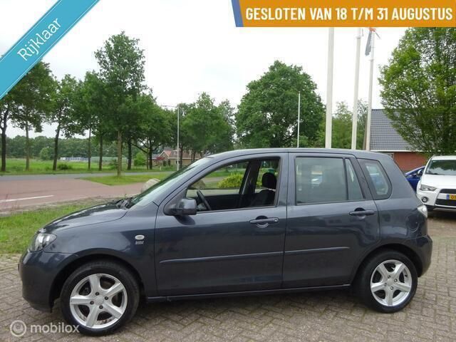Grijs Gebruikt 2007 Mazda 2 Exclusive MPV | € 1.750 (Eerlijke prijs) - Afbeelding 1/4
