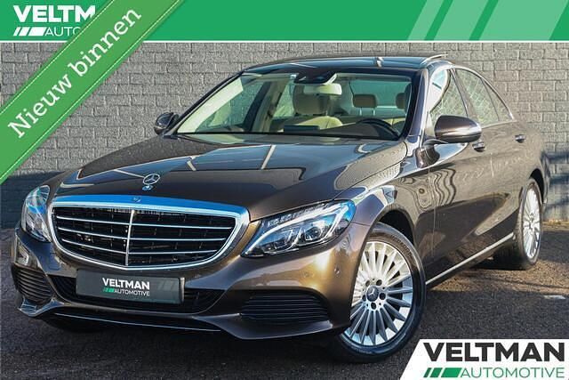 Bruin Occasion 2016 Mercedes C180 Prestige Sedan | € 19.995 (Eerlijke prijs) - Afbeelding 1/4