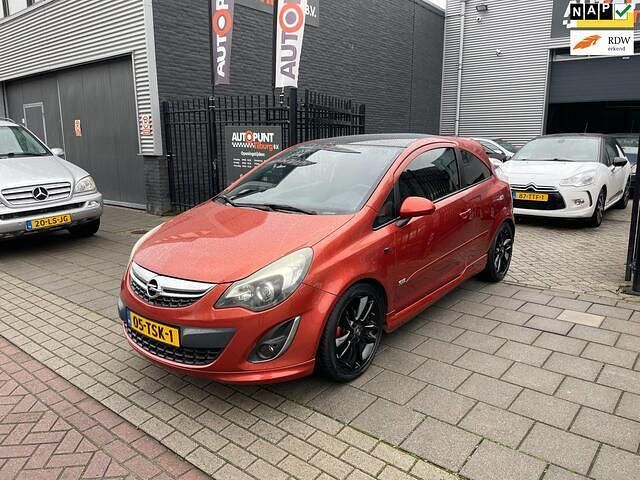 Rood Gebruikt 2012 Opel Corsa Color Edition Hatchback | € 2.999 (Goede deal) - Afbeelding 1/4