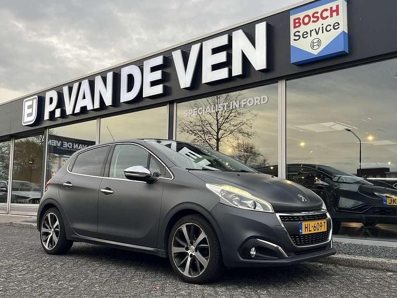 Grijs (mat) Gebruikt 2016 Peugeot 208 Hatchback | € 9.450 (Eerlijke prijs) - Afbeelding 1/4
