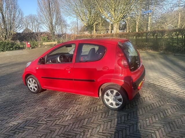 Occasion Peugeot 107 68 PK (50 kW) 2011 Rood Hatchback