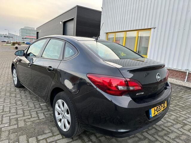 Occasion Opel Astra 116 PK (85 kW) 2014 Zwart Sedan