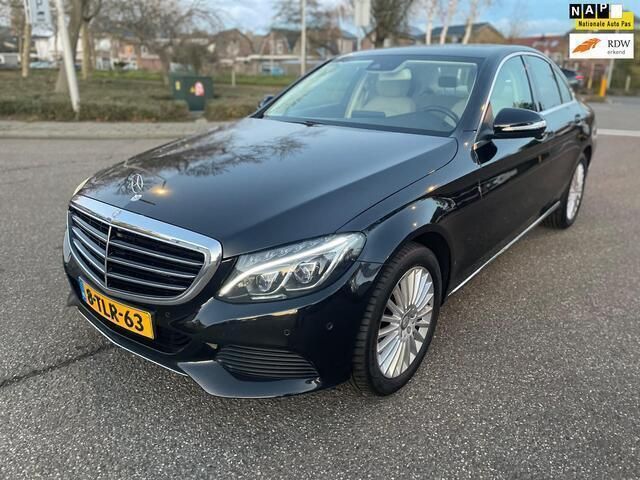 Zwart Gebruikt 2014 Mercedes C180 Prestige Sedan | € 16.495 (Eerlijke prijs) - Afbeelding 1/4