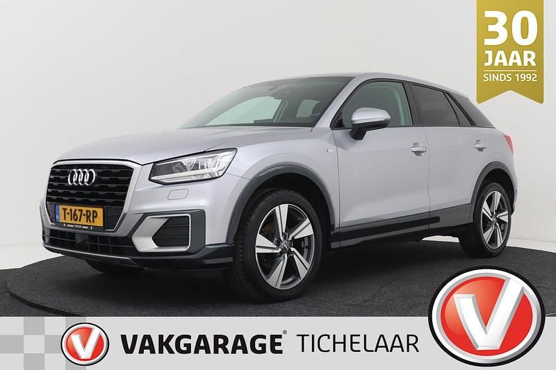 Grijs Gebruikt 2020 Audi Q2 S-Line SUV | € 17.899 (Eerlijke prijs) - Afbeelding 1/3